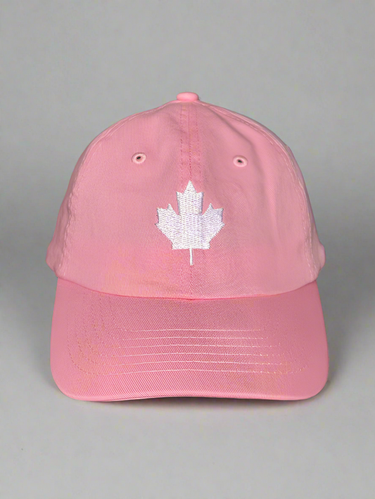 Pink baseball cap with elegant white embroidered maple leaf