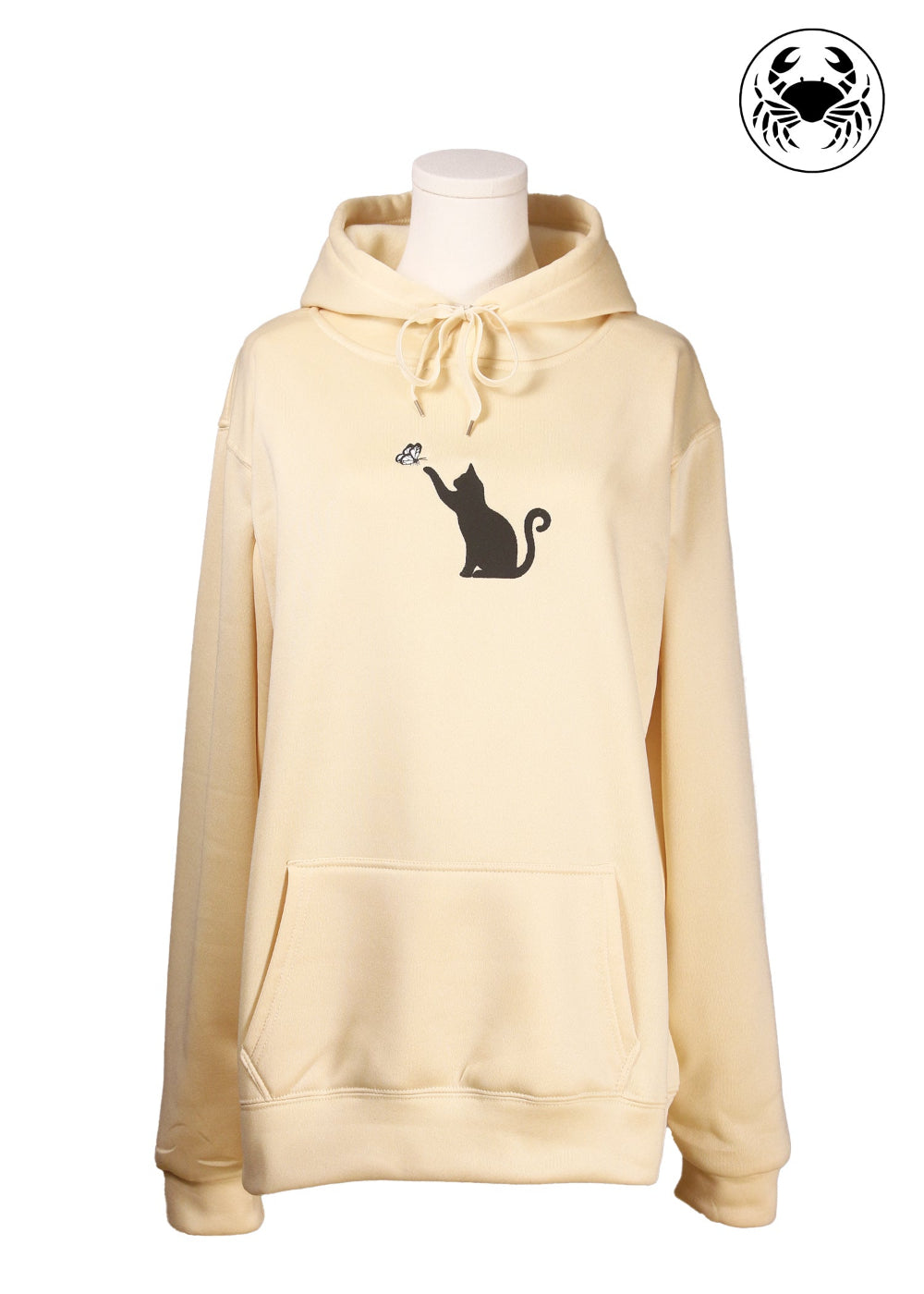 front view Unisex light beige hoodie with a front kangaroo pocket, drawstring hood, and an embroidered chest design featuring a black Cat Caught in a Moment with Butterfly