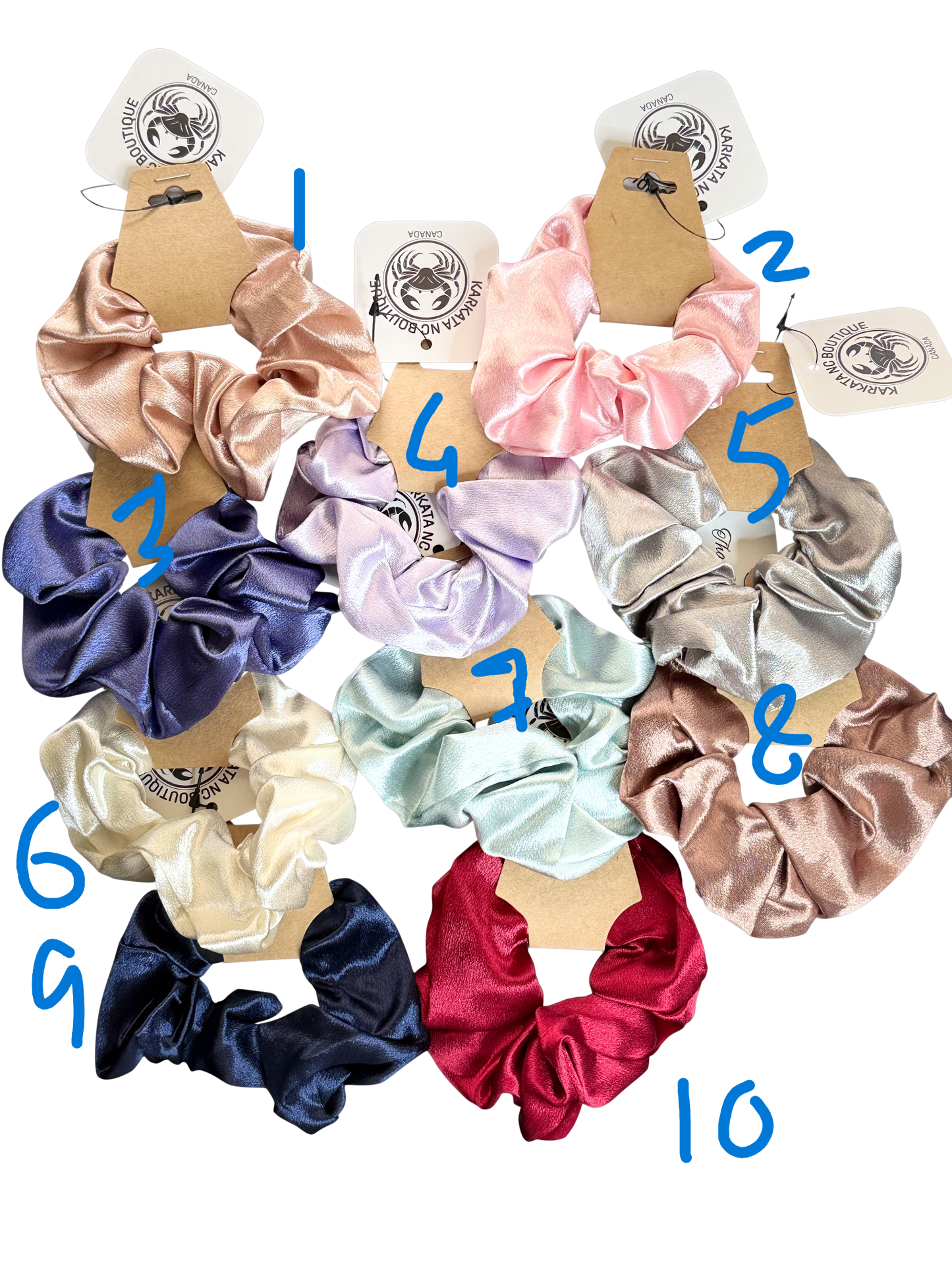 Regular-sized satin scrunchies in assorted colors, by Karkata NC Boutique in Trenton, Ontario