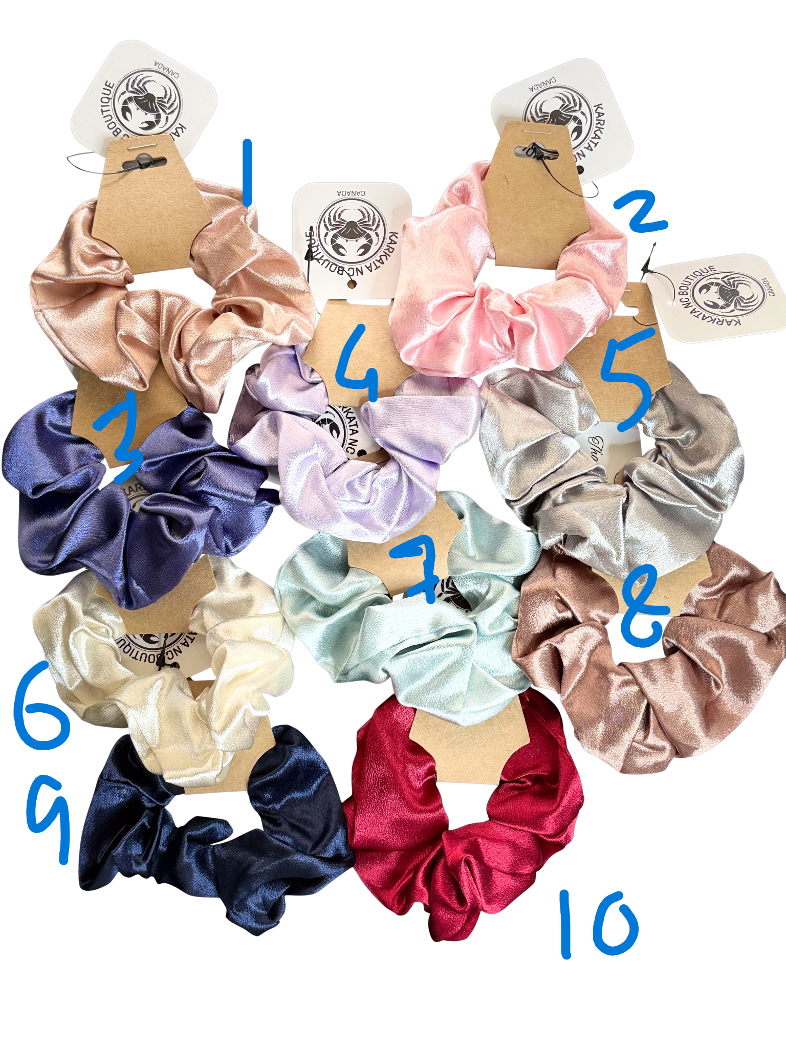 Regular-sized satin scrunchies in assorted colors, by Karkata NC Boutique in Trenton, Ontario