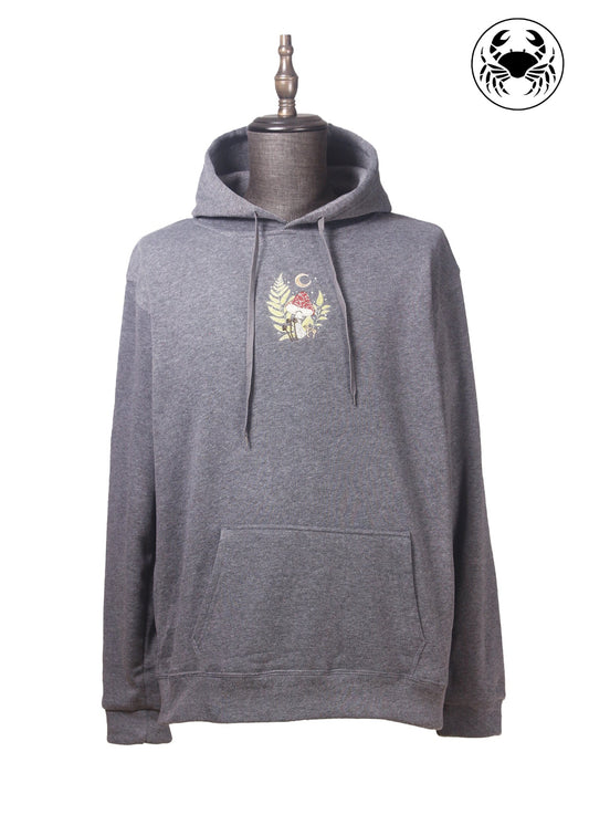 Unisex charcoal gray fleece hoodie with a front kangaroo pocket, drawstring hood, and a chest graphic featuring a mushroom and botanical leaves