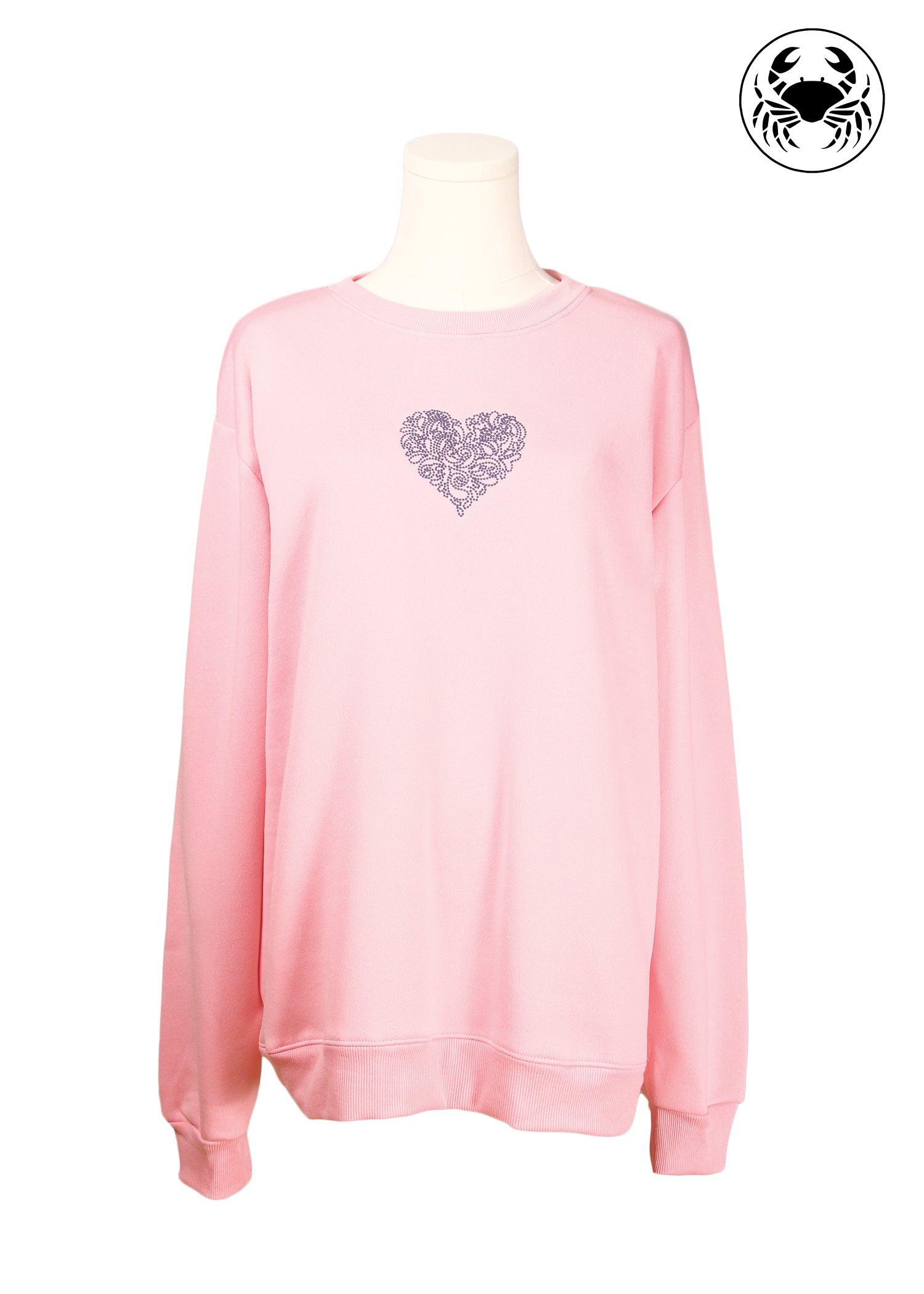 Light pink unisex crewneck sweatshirt featuring a delicate embroidered heart design on the chest, long sleeves, ribbed cuffs and hem