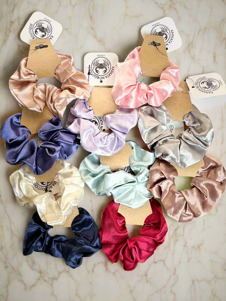 Regular-sized satin scrunchies in assorted colors, by Karkata NC Boutique in Trenton, Ontario